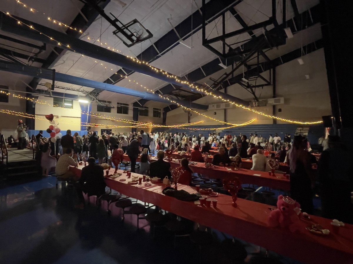 A community event lit with B. Devine string lighting